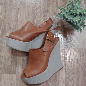 Wardenn leather platform wedge heels.